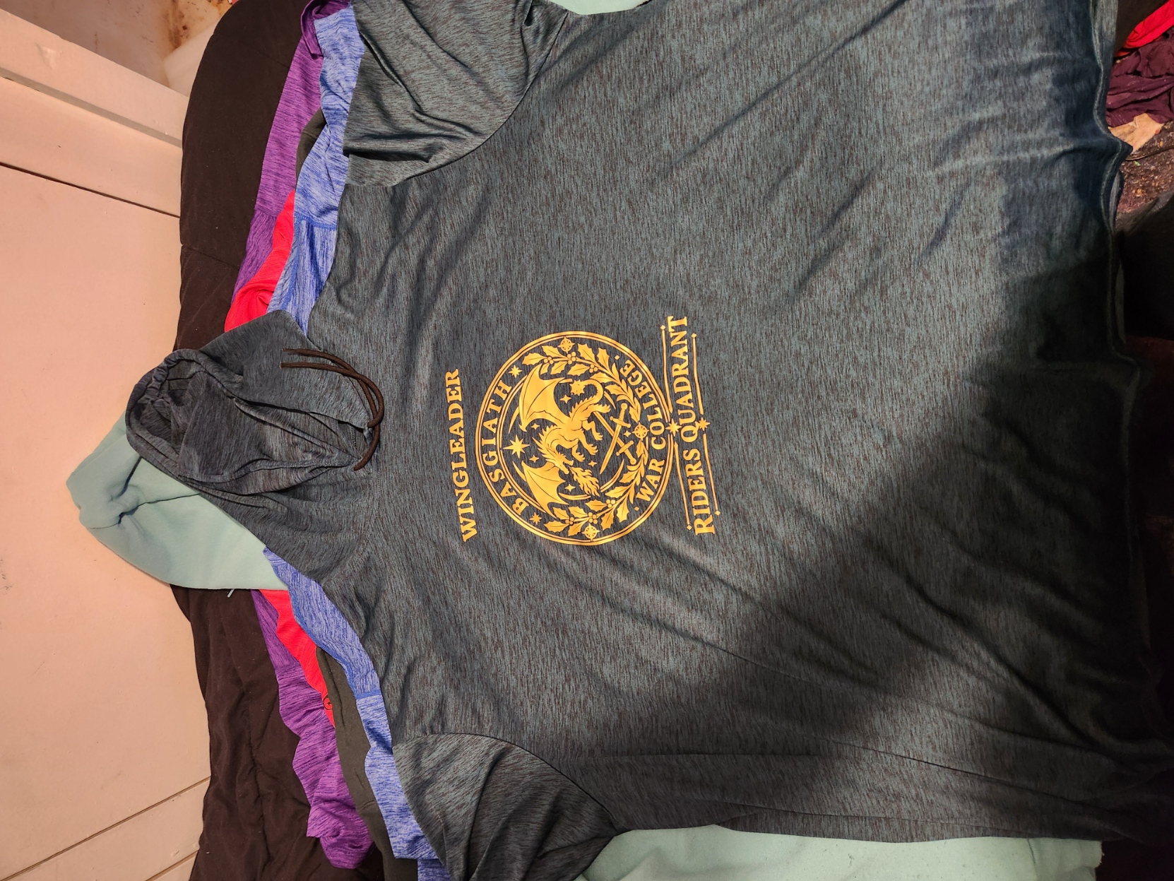 Heather-gray hooded shirt with a gold Wingleader, Basgiath War College, Riders Quadrant dragon design