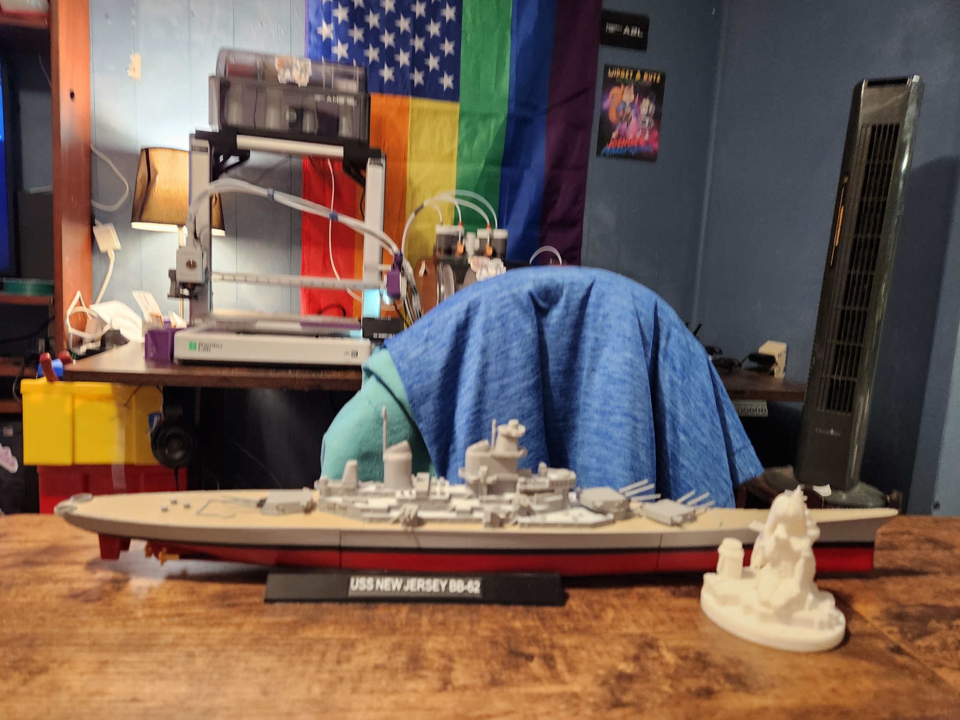 Detailed model of the USS New Jersey BB-62 displayed on a table in front of my 3D-printing station